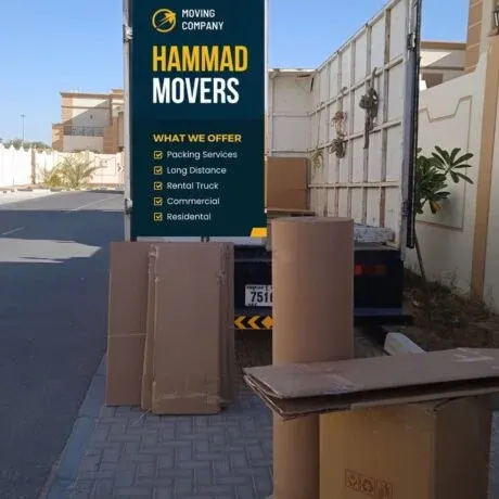 Hammad Movers truck parked with packing boxes ready for loading in Sharjah